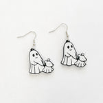 ghost walking a ghost dog, black and white dangly earrings